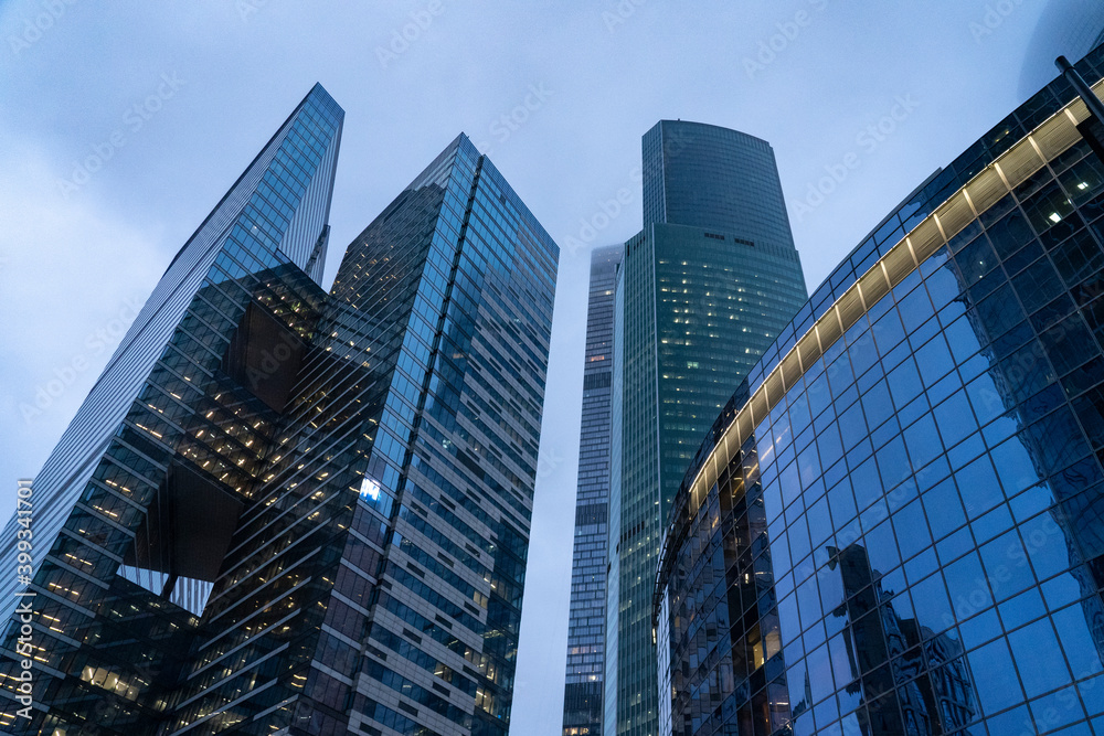 Moscow, Russia, November 30 2020, Moscow international business center (Moscow city), night photography with long exposure, selective focusing, glare of night lights high-rise buildings made of glass