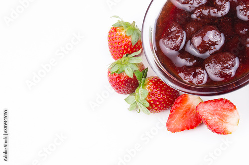 Bowl of strawberry jam isol...