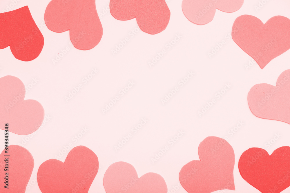 Paper pink background, frame from hearts, copy space.