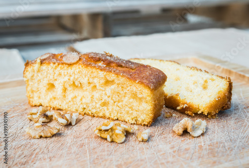 Delicious typical mediterranean spanish cake, a coca. Beautiful pastry slices with nuts and almonds.