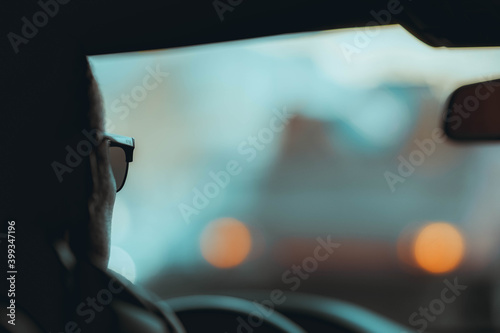 view of a person driving a car