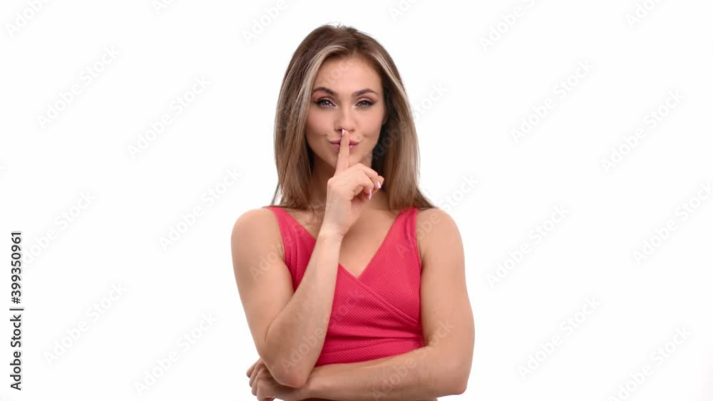 Playful female demonstrate gesture quiet showing forefinger no isolated. Shot with RED camera in 4K Playful female demonstrate gesture quiet showing forefinger no isolated. Shot with RED camera in 4K