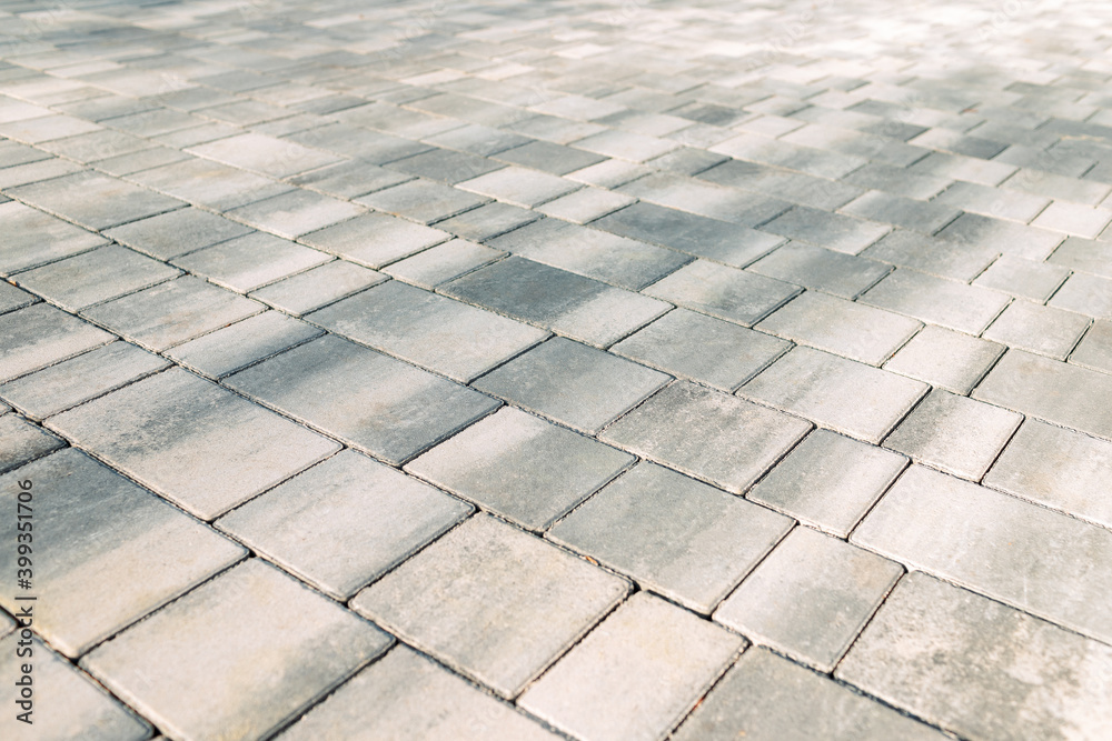 Fototapeta premium gray color paving slabs in the city, pedestrian street