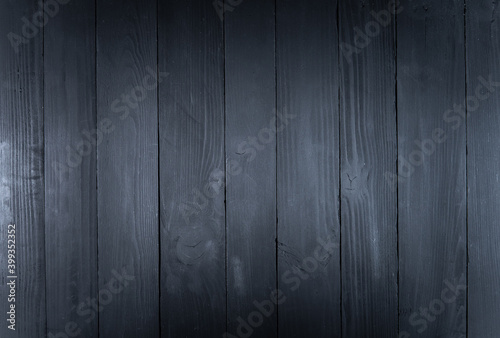 Black background of wooden plank. Dark gray borads table