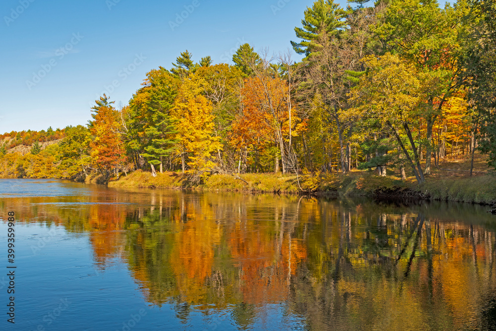 Fall Reflections on a Calm River