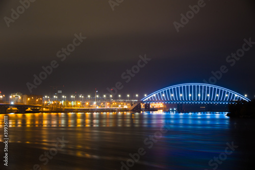 Kyiv, Ukraine 11.11.2020: View of the Podilskyi Bridge with bright lights at night