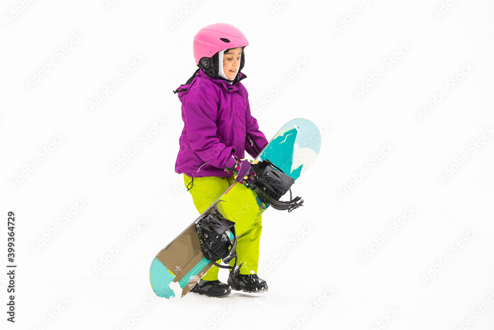 Little Cute Girl Snowboarding at ski resort in sunny winter day. Little Cute Girl Snowboarding at ski resort in sunny winter day.