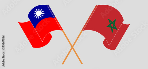 Crossed and waving flags of Taiwan and Morocco