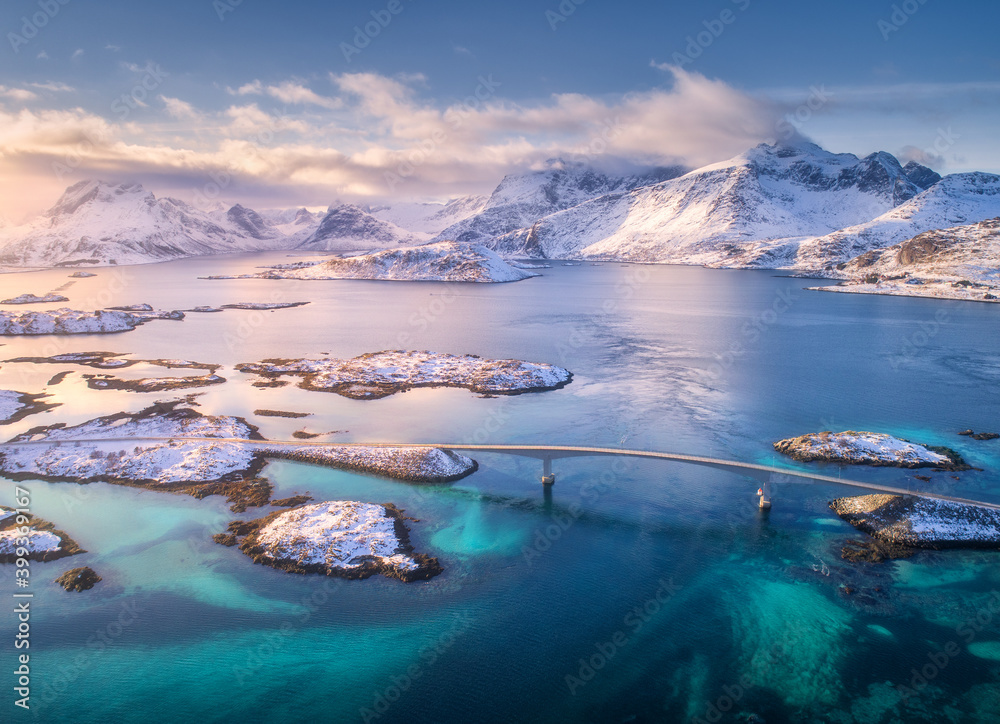 Aerial View Of Bridge Over The Sea And Snowy Mountains In Lofoten ...