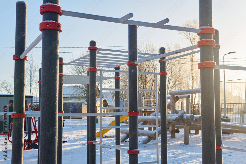outdoor public sports playground on a frosty winter day
