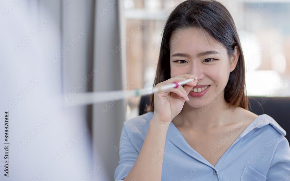 Portrait of asian woman doing eye test in optical lab Portrait of asian woman doing eye test in optical lab