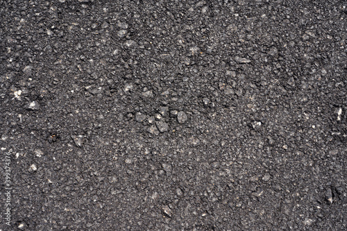 The texture of the new black asphalt as a background.