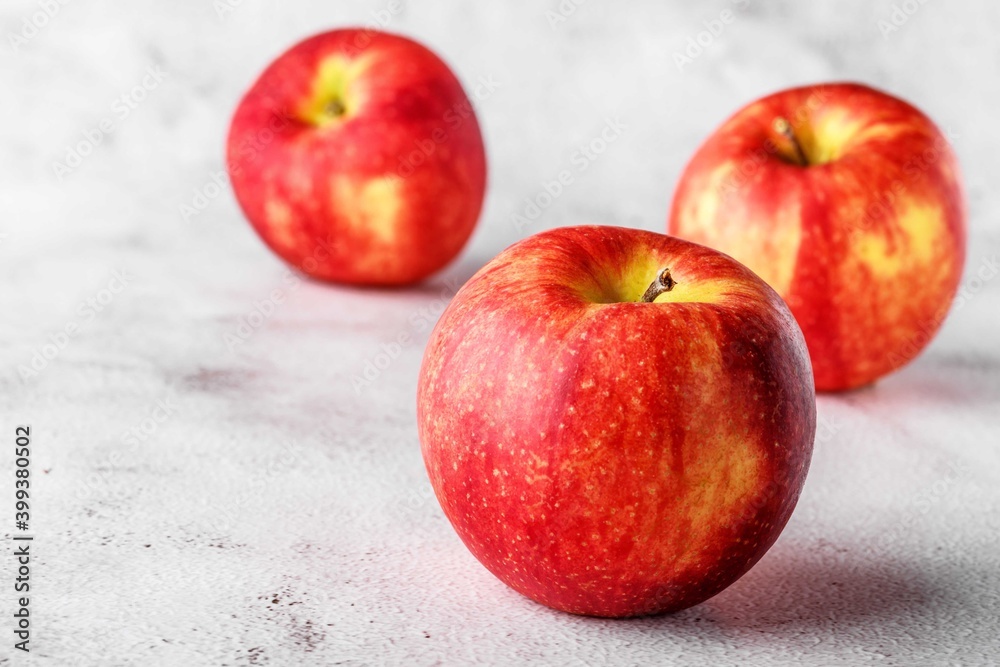 red apples on blackboard or chalkboard background. Bright fruit composition. Close-up on a gray background. red apples on blackboard or chalkboard background. Bright fruit composition. Close-up on a gray background.