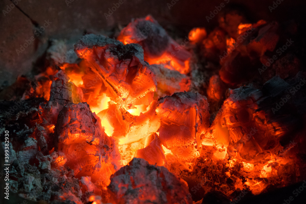 Glowing barbecue embers in the dark Glowing barbecue embers in the dark