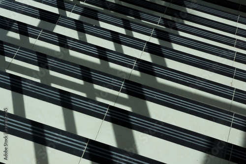 Abstract image of a combination of black lines on the steps and shadows