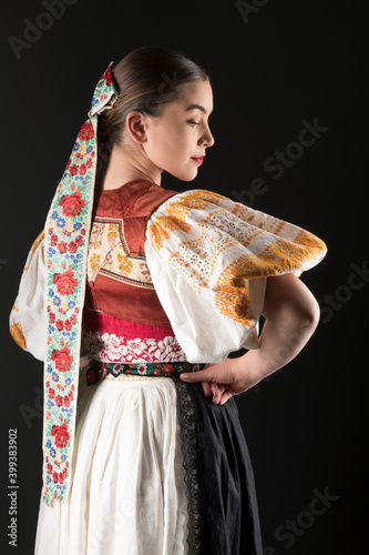 Slovak folklore. Slovakian folklore girl. Beuatiful young girl in slovak folk dress photo