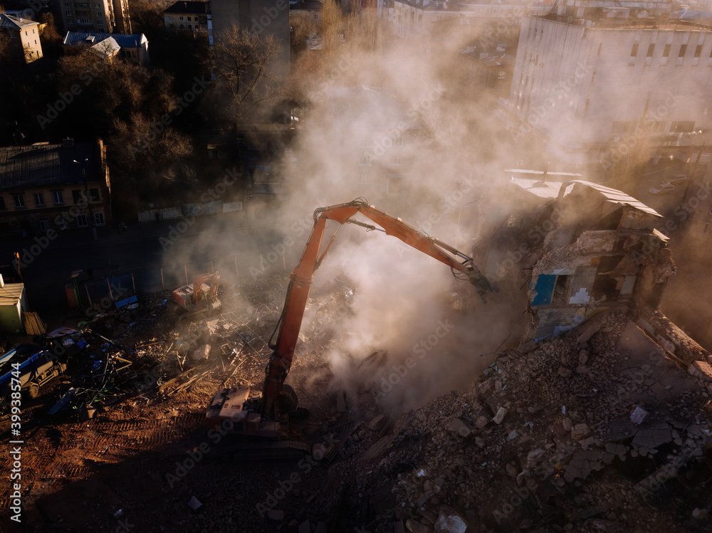 Obraz premium Aerial view of demolition site. Process of demolition of old industrial building