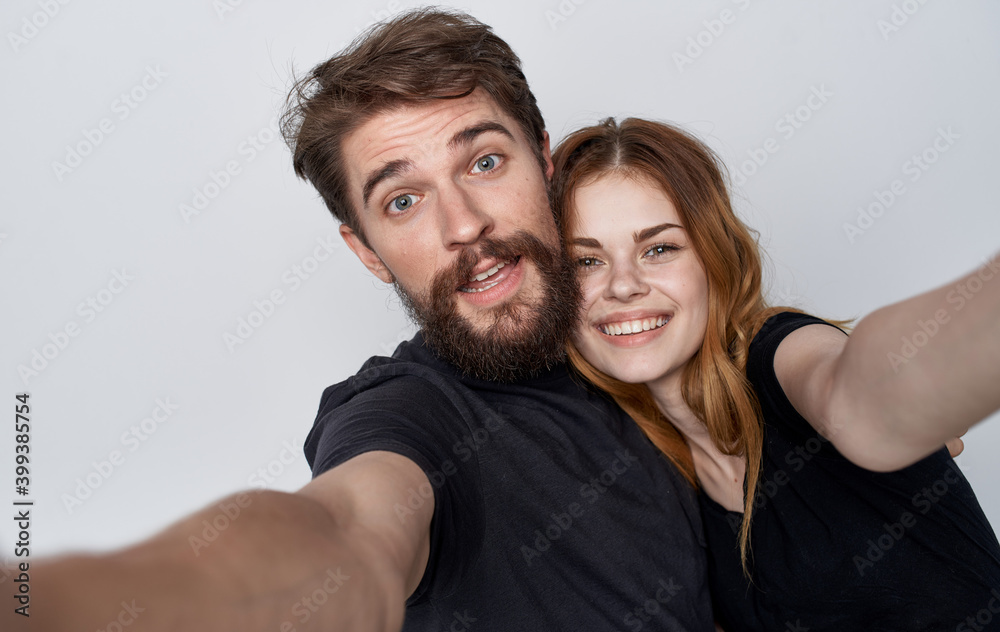 cheerful young couple lifestyle studio friendship emotions isolated background cheerful young couple lifestyle studio friendship emotions isolated background