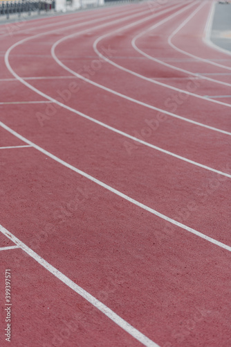 Red track at athletics stadium photo