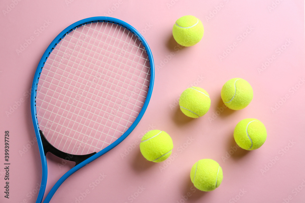 Tennis racket and balls on pink background, flat lay. Sports equipment