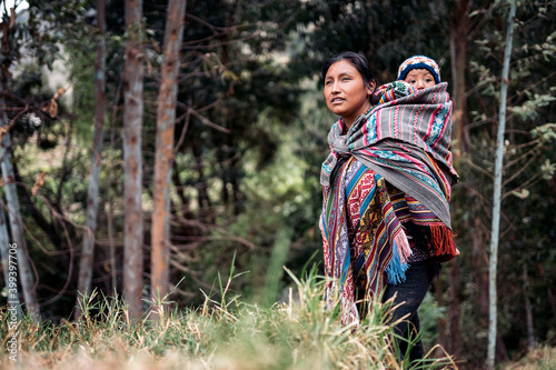 Mother With Her Son Walking Around In The Mountains photo