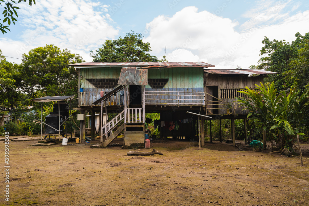 Wooden house built at high in the jungle Wooden house built at high in the jungle