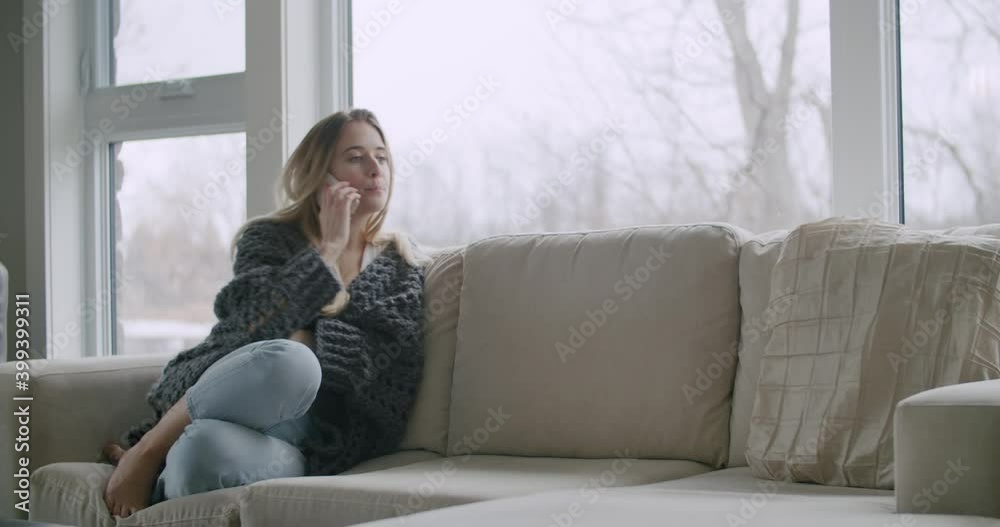 Woman Talking Calling on Cell Mobile Phone Smartphone gets Bad Sad Concerning Tragic News from Friend Family Doctor in Living Room on Couch Woman Talking Calling on Cell Mobile Phone Smartphone gets Bad Sad Concerning Tragic News from Friend Family Doctor in Living Room on Couch