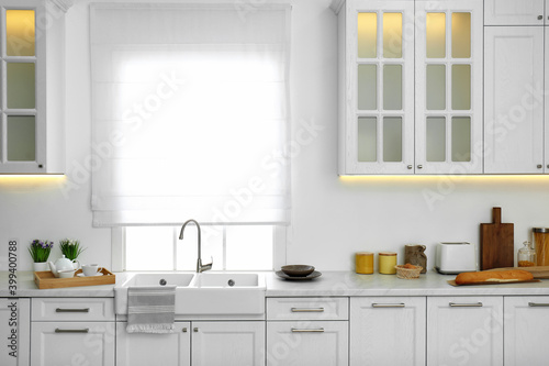 Modern kitchen interior with stylish white furniture © New Africa