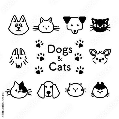 複数の犬と猫の顔のモノクロのイラスト