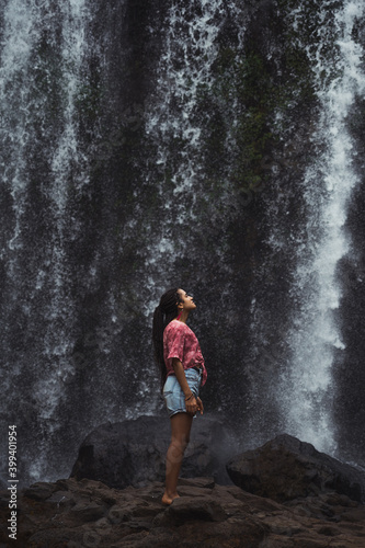 Black girl in a waterfall photo