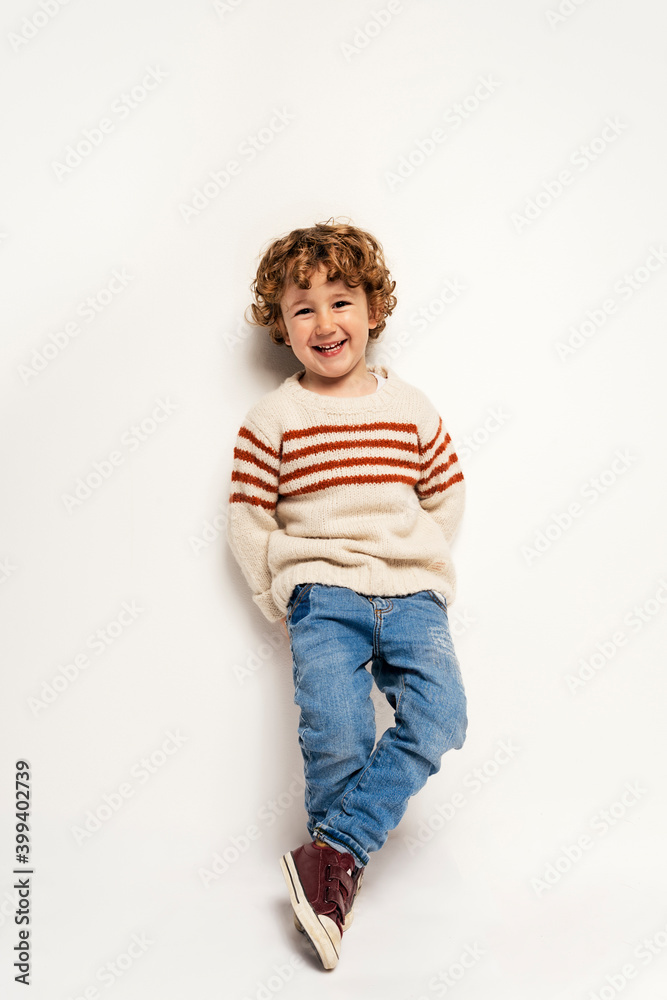 Caucasian kid in studio smiling. Caucasian kid in studio smiling.