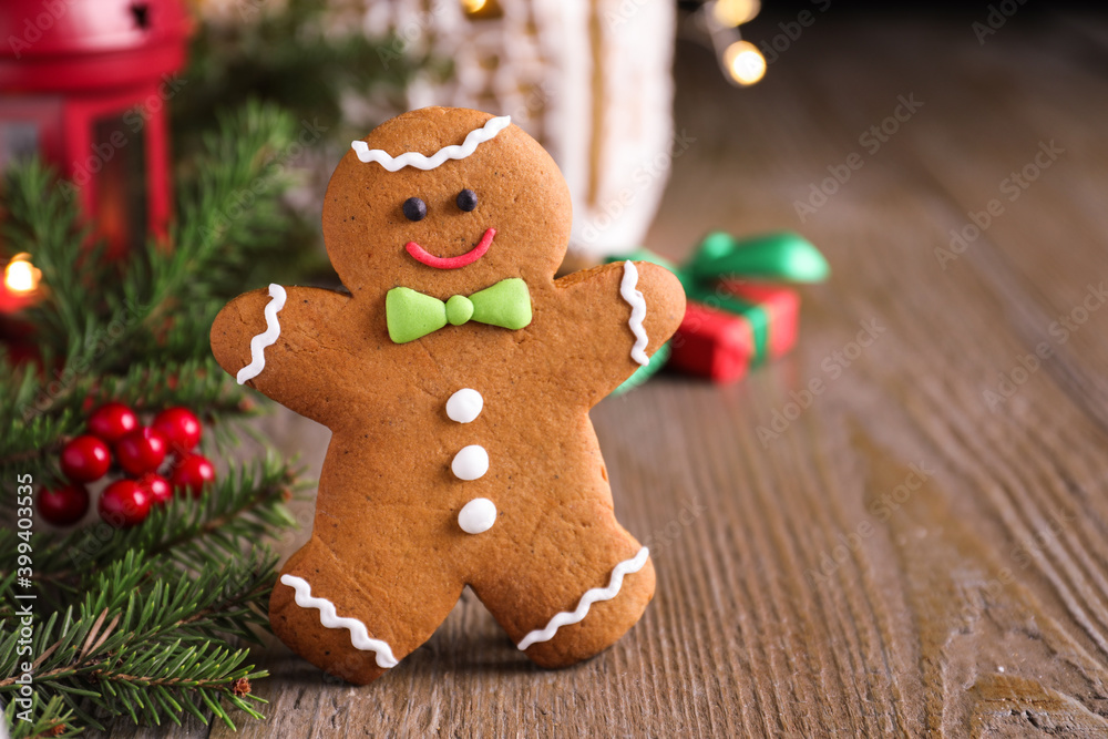 Gingerbread man on wooden table, closeup view Gingerbread man on wooden table, closeup view