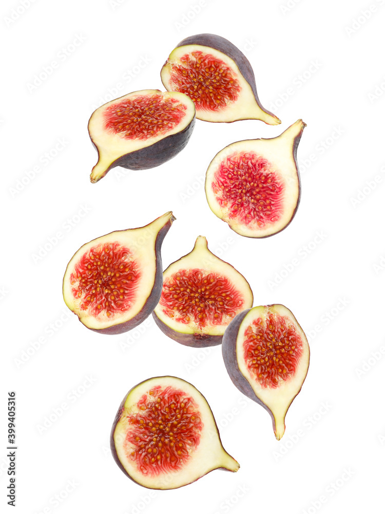 Falling tasty ripe figs on white background Falling tasty ripe figs on white background