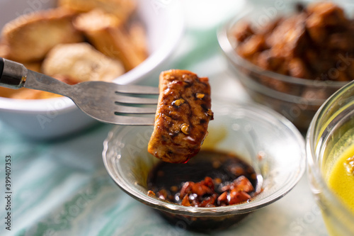 Healthy and delicious Indonesian fried tofu with chili soy sauce photo