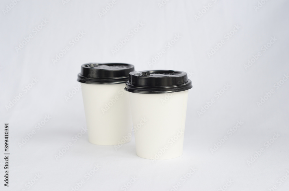 photo white cup plain on white background , mock up glass plastic photo white cup plain on white background , mock up glass plastic