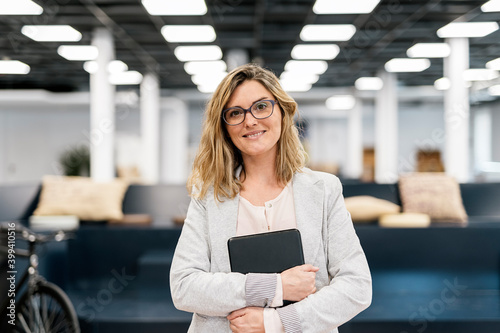 Portrait of Business Woman Looking at Camera photo