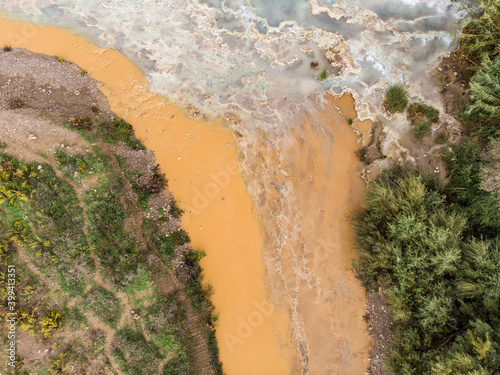 Aerial view of river running off hot springs in Terme Petriolo, Monticiano, Italy. photo