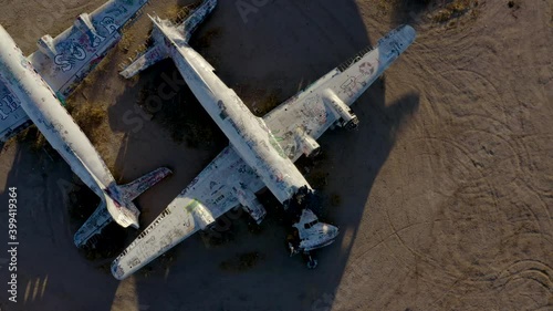 Abandoned DC-5 Aircraft Covered in Graffiti in Boneyard photo