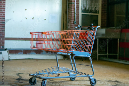 A Shopping Cart Inside an Empty Room in an Abandoned Building