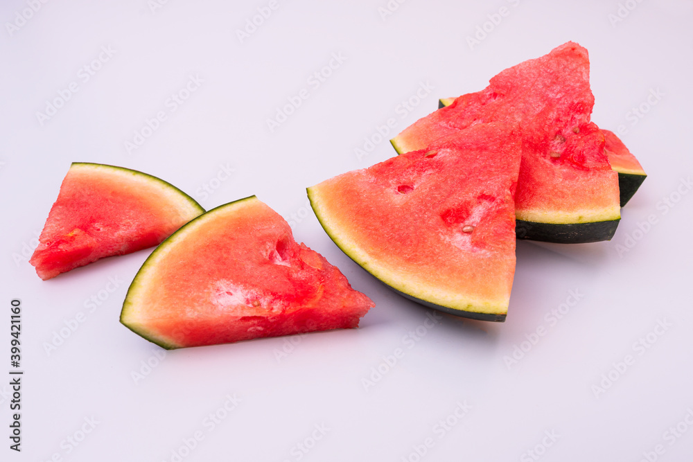 rectangular watermelon chunks on light blue tone table rectangular watermelon chunks on light blue tone table