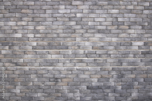 Grey brick wall surface texture background. Textured wall for your design.