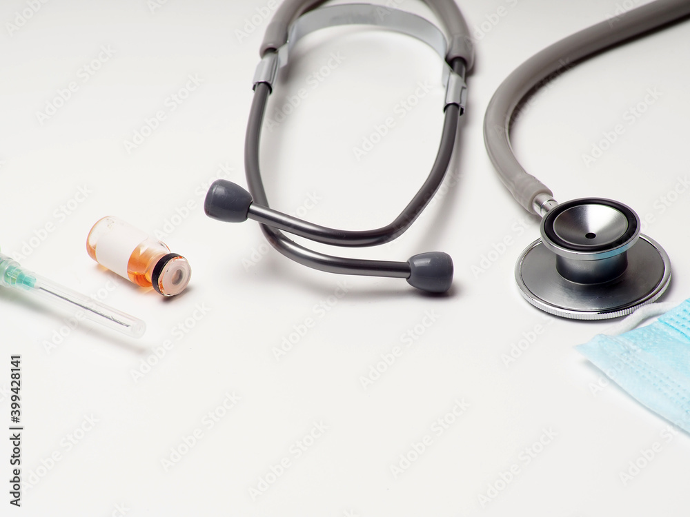 Close up Shoot of medical instruments such as face mask, googles,
stethoscope, on an isolated white background Close up Shoot of medical instruments such as face mask, googles,
stethoscope, on an isolated white background