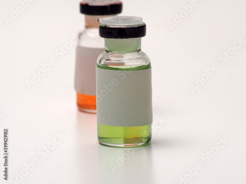 Close up shoot of vaccine on a bottle, capture on white isolated background