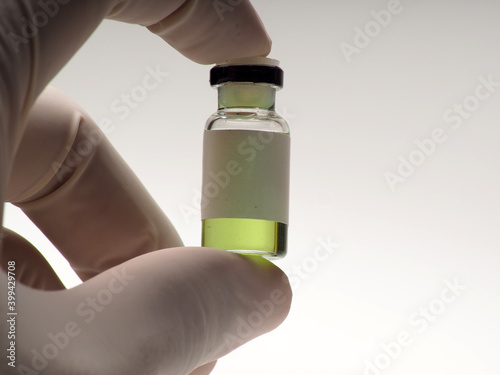 Wallpaper Mural Close up shoot of vaccine on a bottle, capture on white isolated background Torontodigital.ca