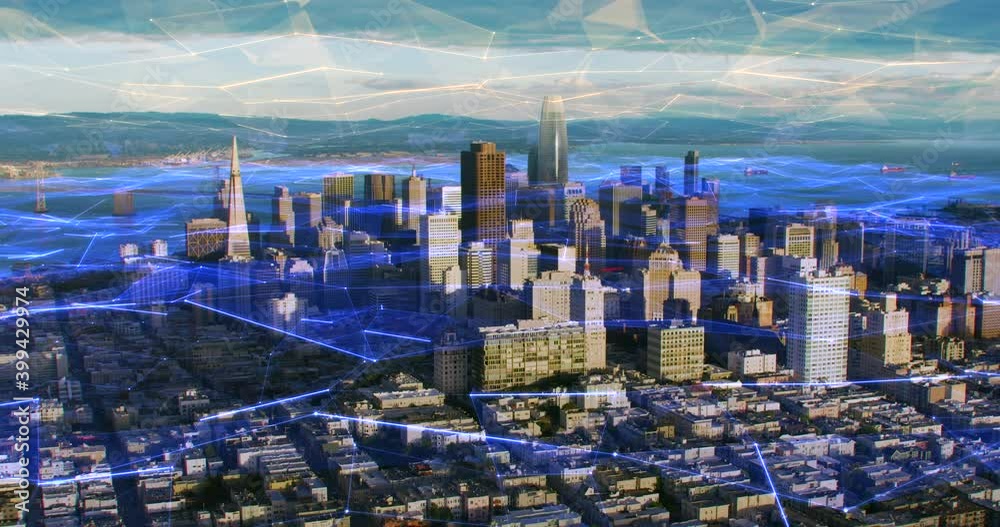 Futuristic aerial view of San Francisco Financial District and the Oakland Bridge with blue holographic networks representing concepts as augmented reality, smart cities, artificial intelligence, IOT.