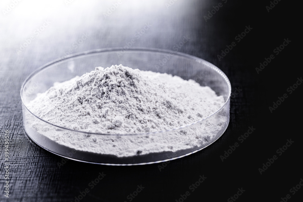 Calcium carbonate, the result of the reaction of calcium oxide with carbon dioxide. Being prepared in petri dish Calcium carbonate, the result of the reaction of calcium oxide with carbon dioxide. Being prepared in petri dish