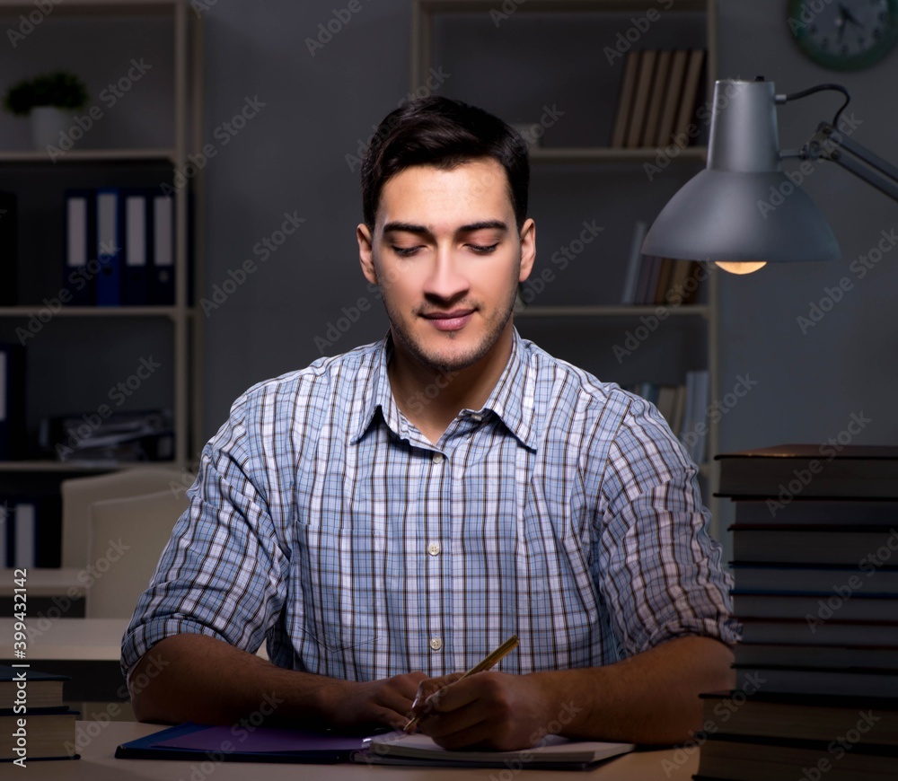 Student preparing for exams late at night Student preparing for exams late at night