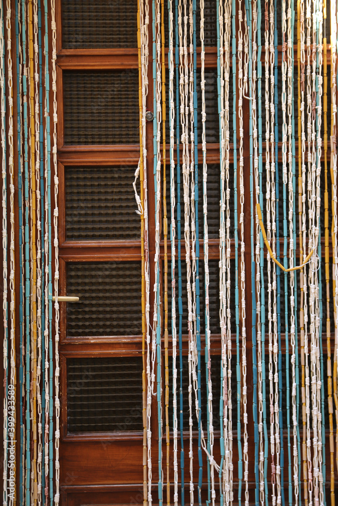 Obraz premium Curtain In Front Of The Entrance In Izola, Slovenija