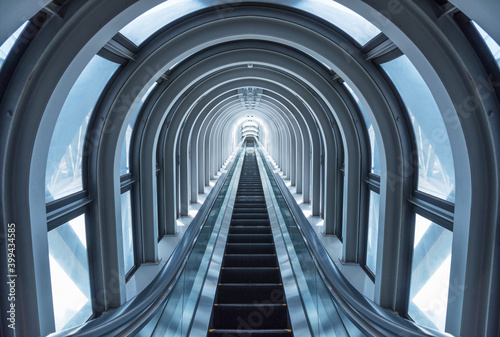 Futuristic escalator in modern tunnel