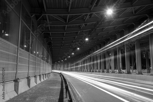 light trails and head lights of traffic in tunnel. Transportation background